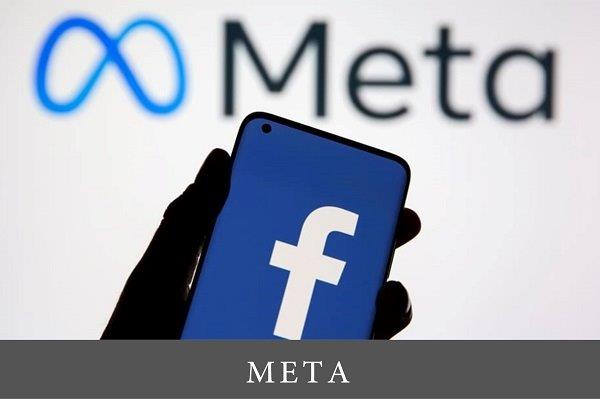 slika mobilnog telefona sa logom fejbuka na ekranu iza koda se nalazi novi Meta logo